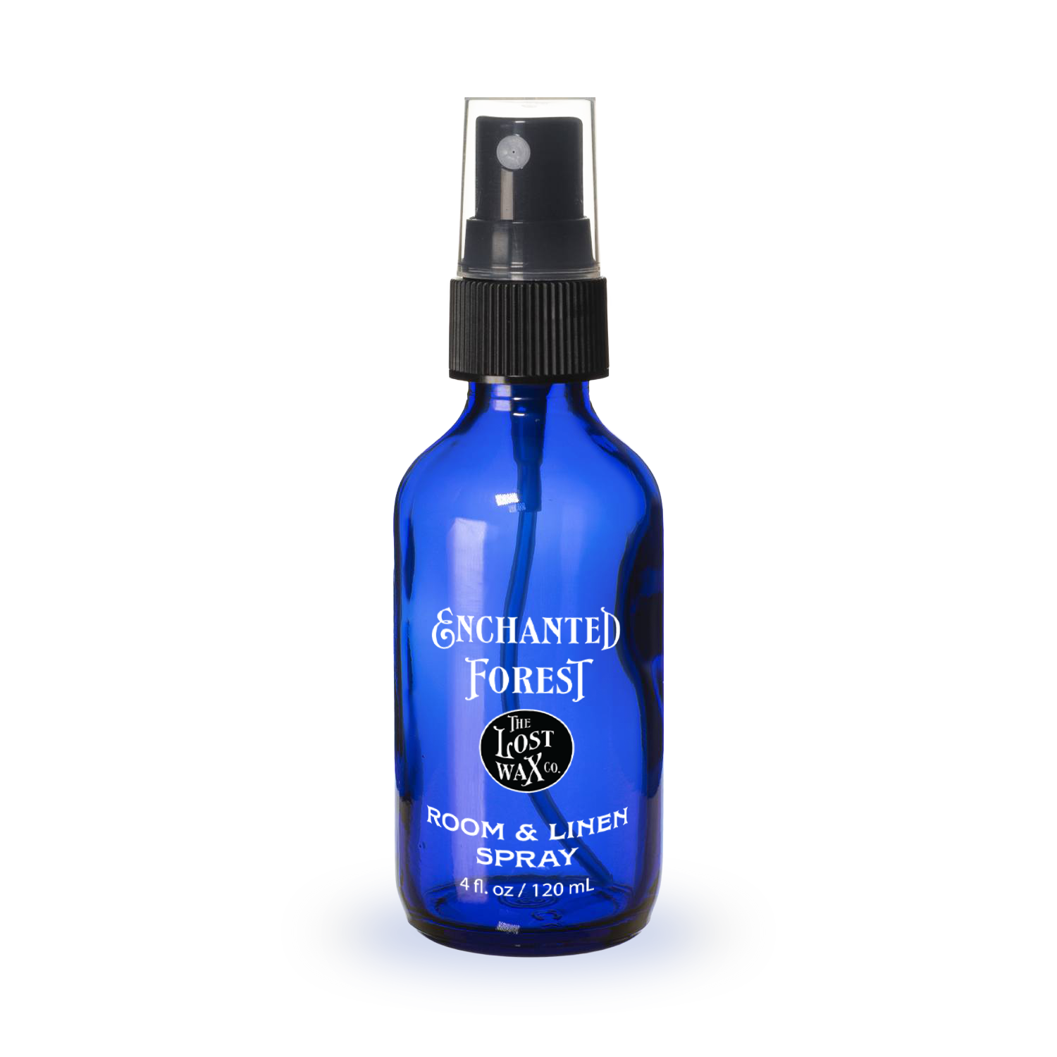 Blue spray bottle labeled 'Enchanted Forest' on a white background
